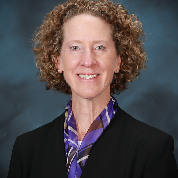 Celia Merzbacher Headshot