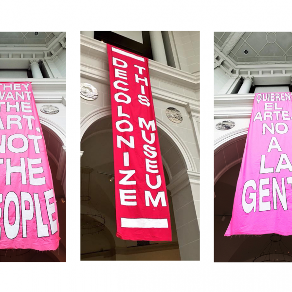 Banners dropped inside the Brooklyn Museum as part of an action organized by Decolonize This Place.