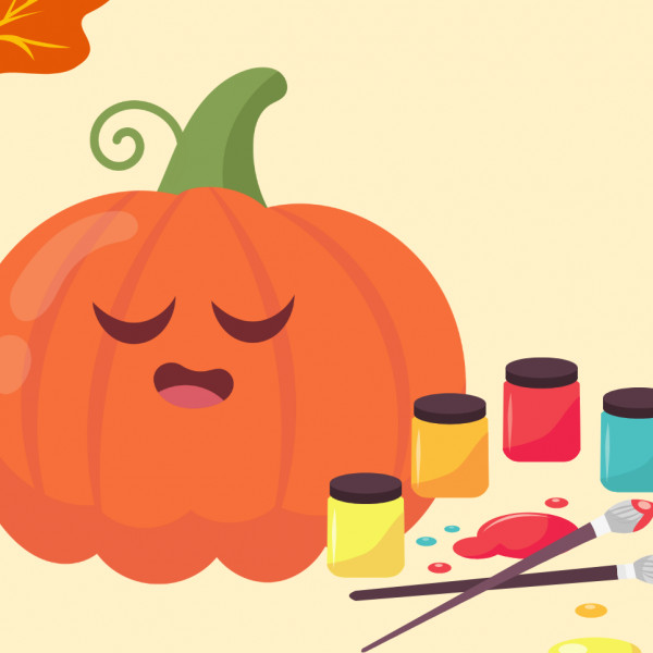 Orange pumpkin with canisters of yellow, red, and blue paints on its left side.